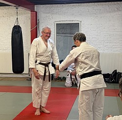 New black belt Patrick Dieu